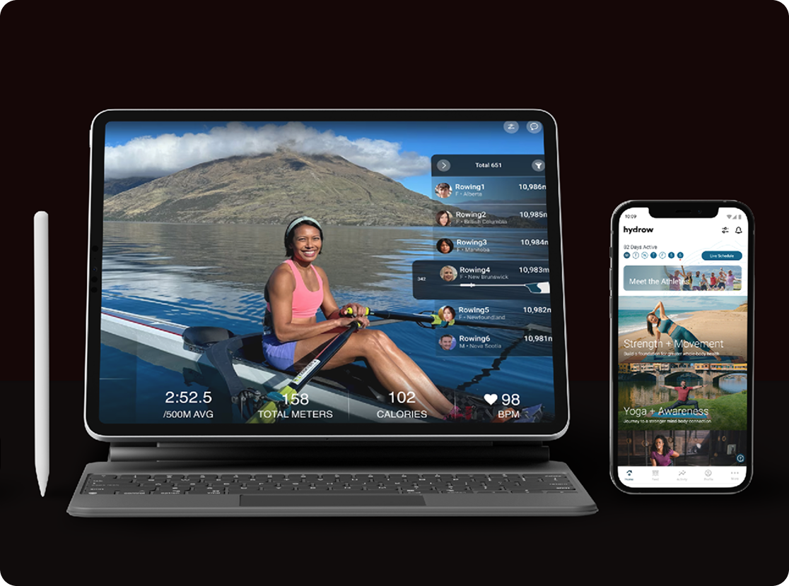Hydrow — iPad workout view paired with the iOS companion app showing strength + yoga programmes